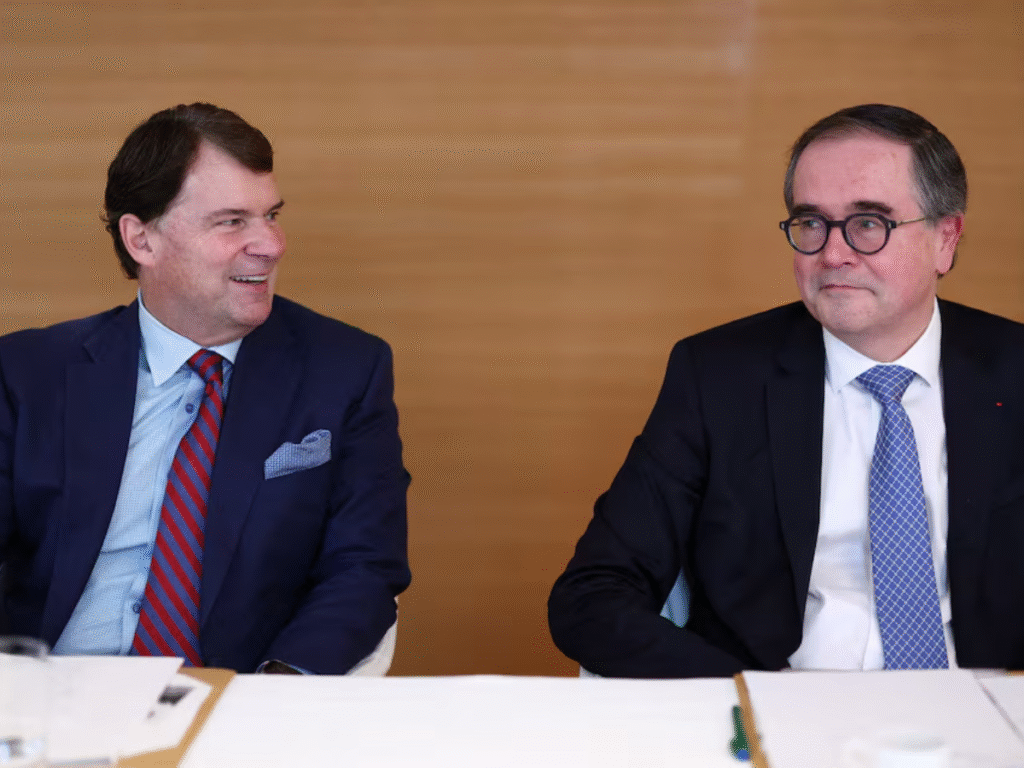 Ford CEO Jim Farley and Renault Group CEO Francois Provost speaking at a joint press conference announcing their new passenger and commercial vehicle partnership in Paris.