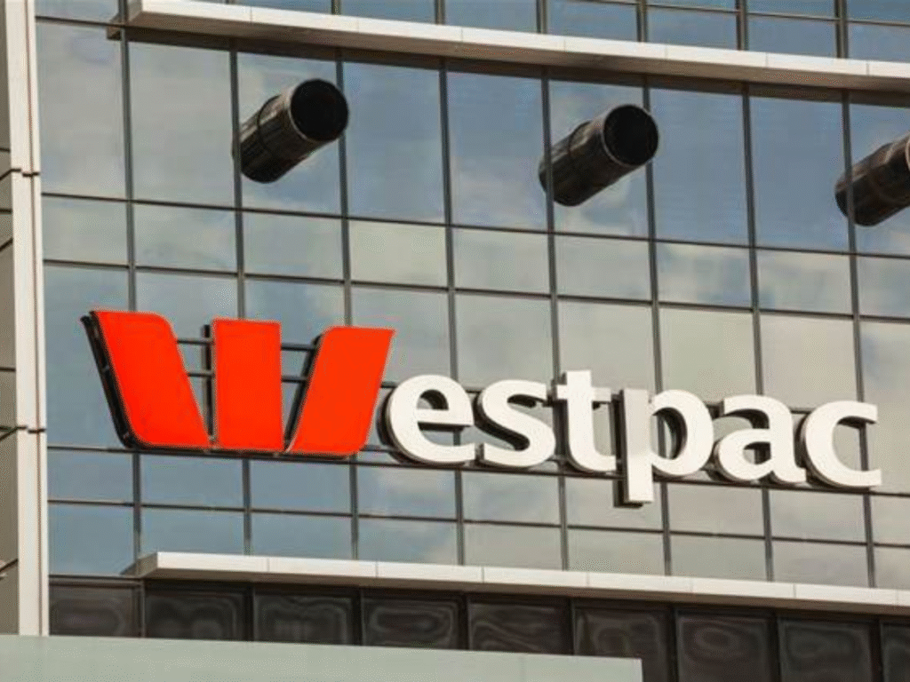 Exterior view of a Westpac building with the bank’s logo displayed on a glass façade.